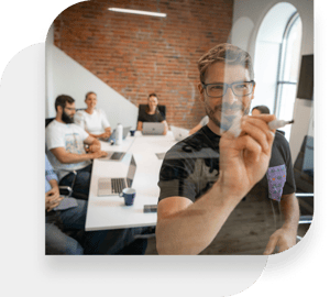 Kimoby employees collaborating in a room at the office